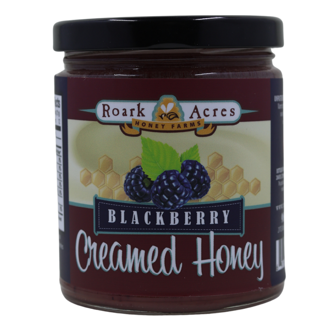 Jar of Roark Acres Blackberry Creamed Honey on a white background