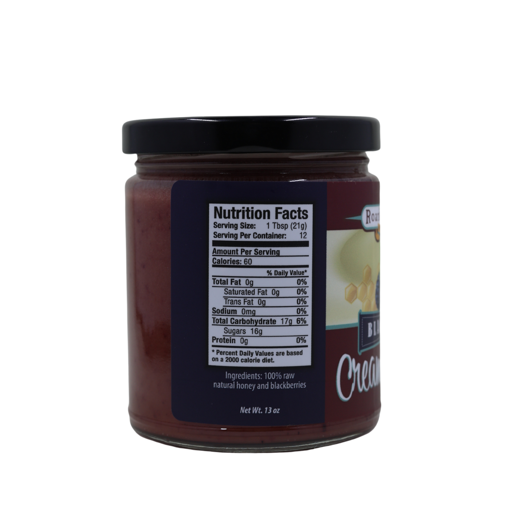 Jar of blackberry honey with a nutrition facts label on a white background