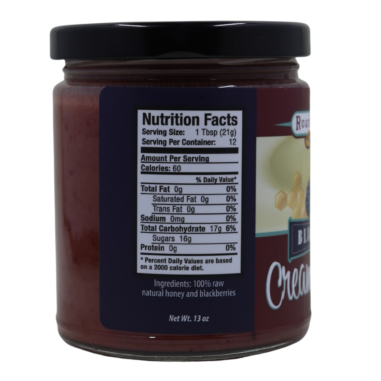 Jar of blackberry honey with a nutrition facts label on a white background