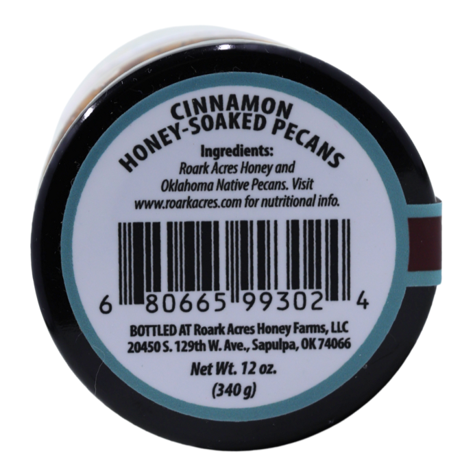 Cinnamon honey-soaked pecans container lid with label on a white background