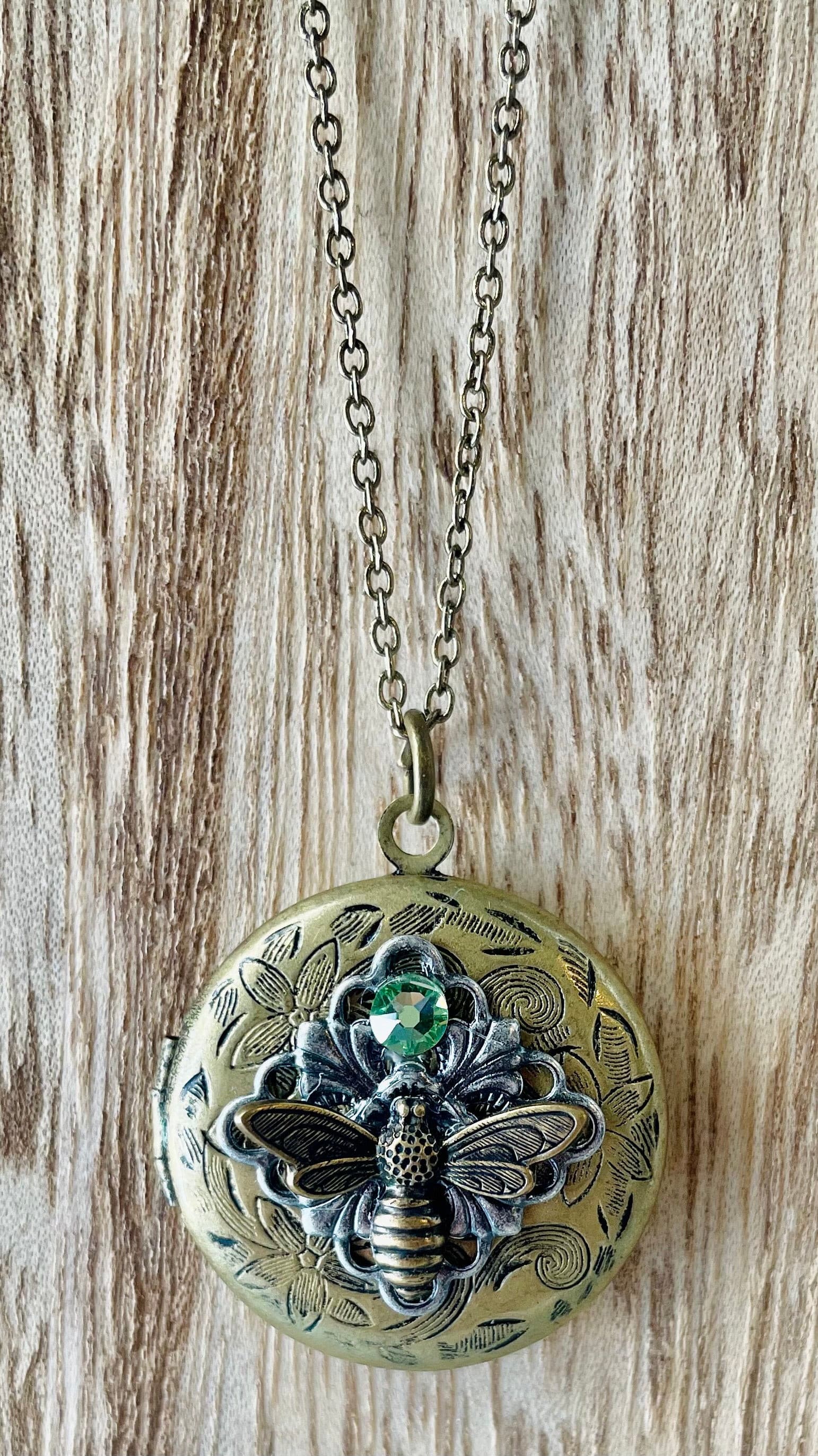 Handmade Bee Lockets by Desi Kelsch.